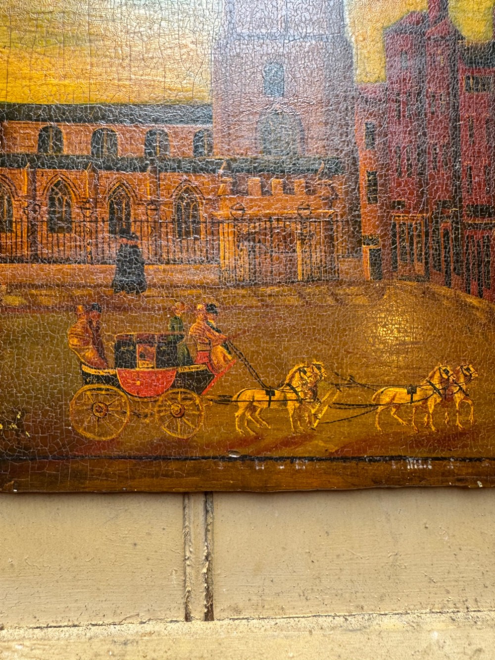 An antique naive oil painting depicting St Nicholas Square in Newcastle with horse-drawn carriages and figures set within a dark wooden frame. View VIII