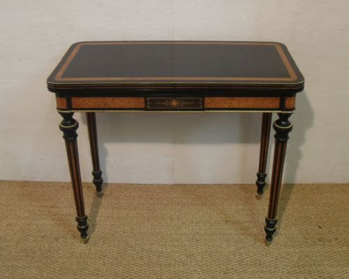 Ebonised and Amboyna Games Table