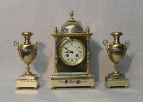 Brass and Gilt Champleve Clock Set