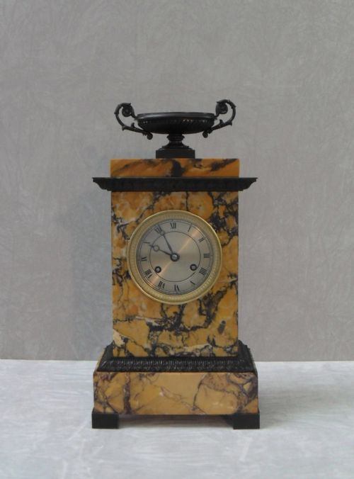 French Neoclassical Sienna Marble and Bronze Mantel Clock