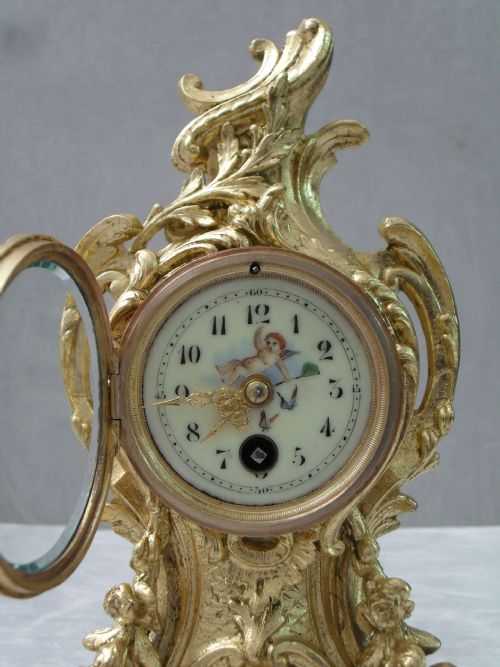 fig 1. French Gilt Metal Rococo Style Mantel Clock