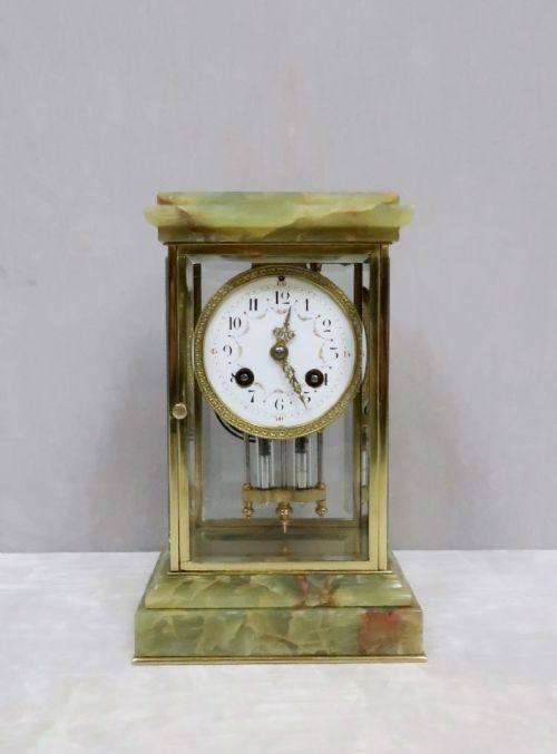 French Onyx and Brass Four Glass Mantel Clock by Samuel Marti