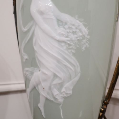 fig 3. A French Neoclassical style table lamp featuring a pale green pate-sur-pate porcelain urn base, dark bronze side handles, and a pleated cream shade.