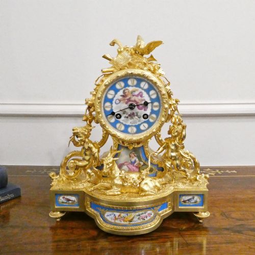 French Gilt Bronze & Porcelain Mantel Clock by Henry Marc