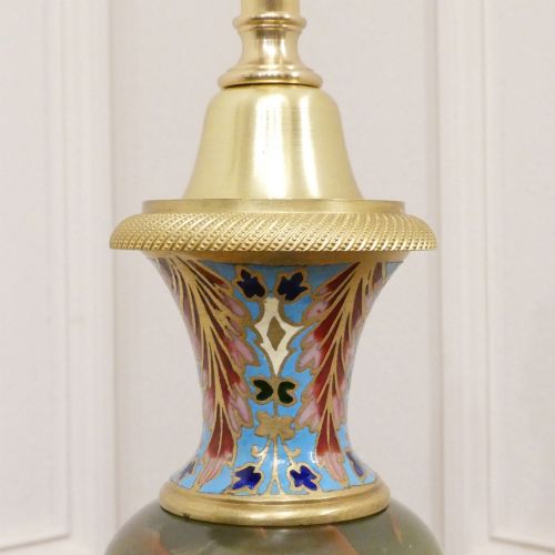 fig 2. A pair of French table lamps featuring urn-shaped green onyx columns detailed with polychrome champleve enamelling and topped with pleated white shades.