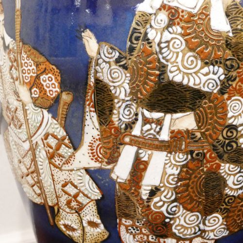 fig 3. A pair of cobalt blue Japanese Satsuma porcelain table lamps decorated with gilded hand-painted figures and fitted with brass mountings and a cream pleated shade.