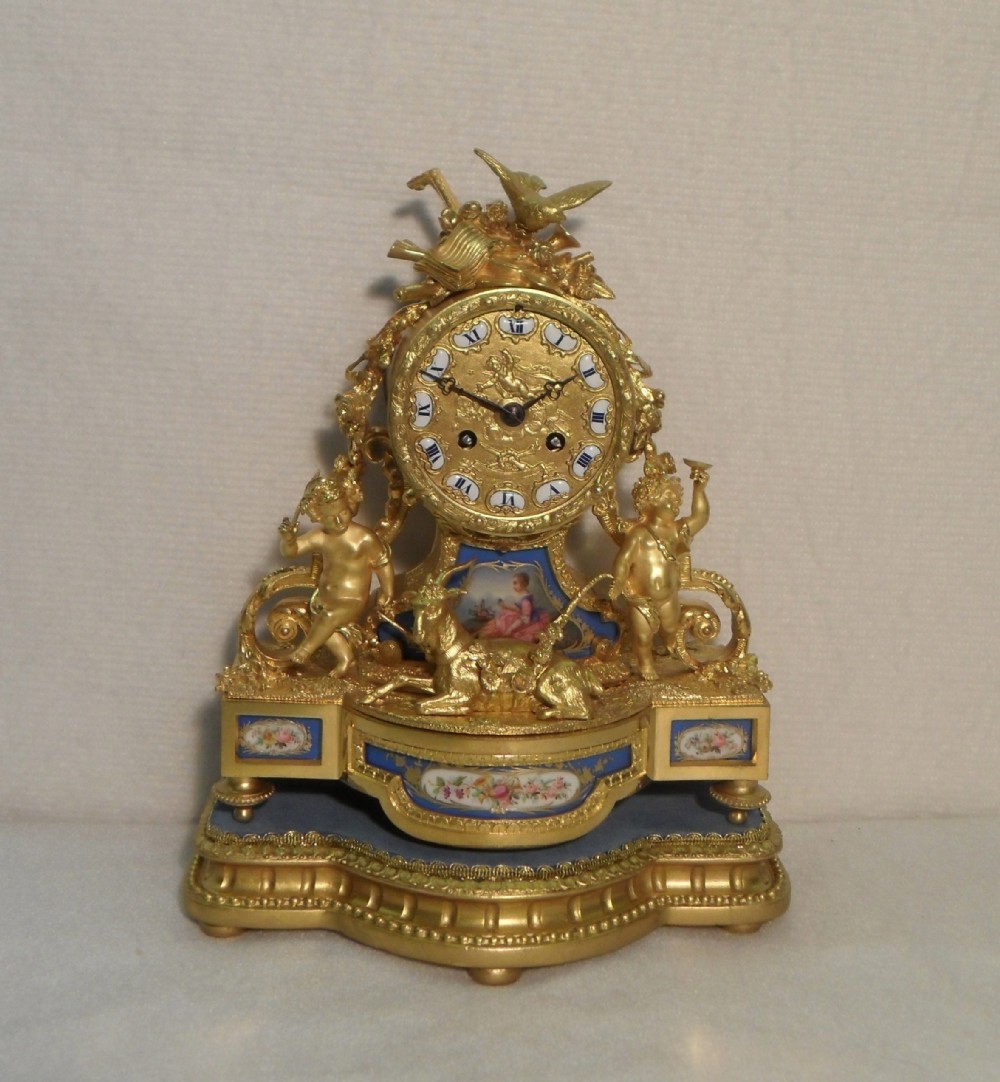 French Ormolu and Porcelain Mantel Clock