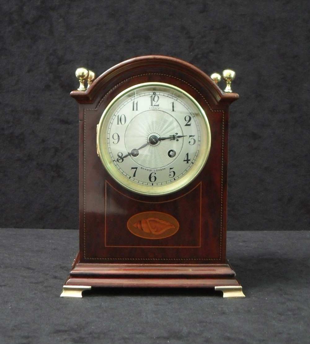 French Mahogany Mantel Clock with Silvered Dial