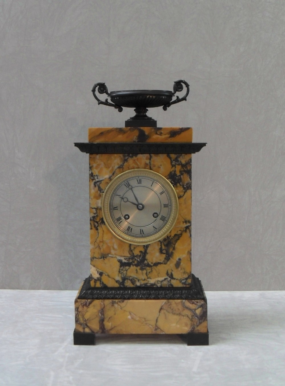 French Neoclassical Sienna Marble and Bronze Mantel Clock