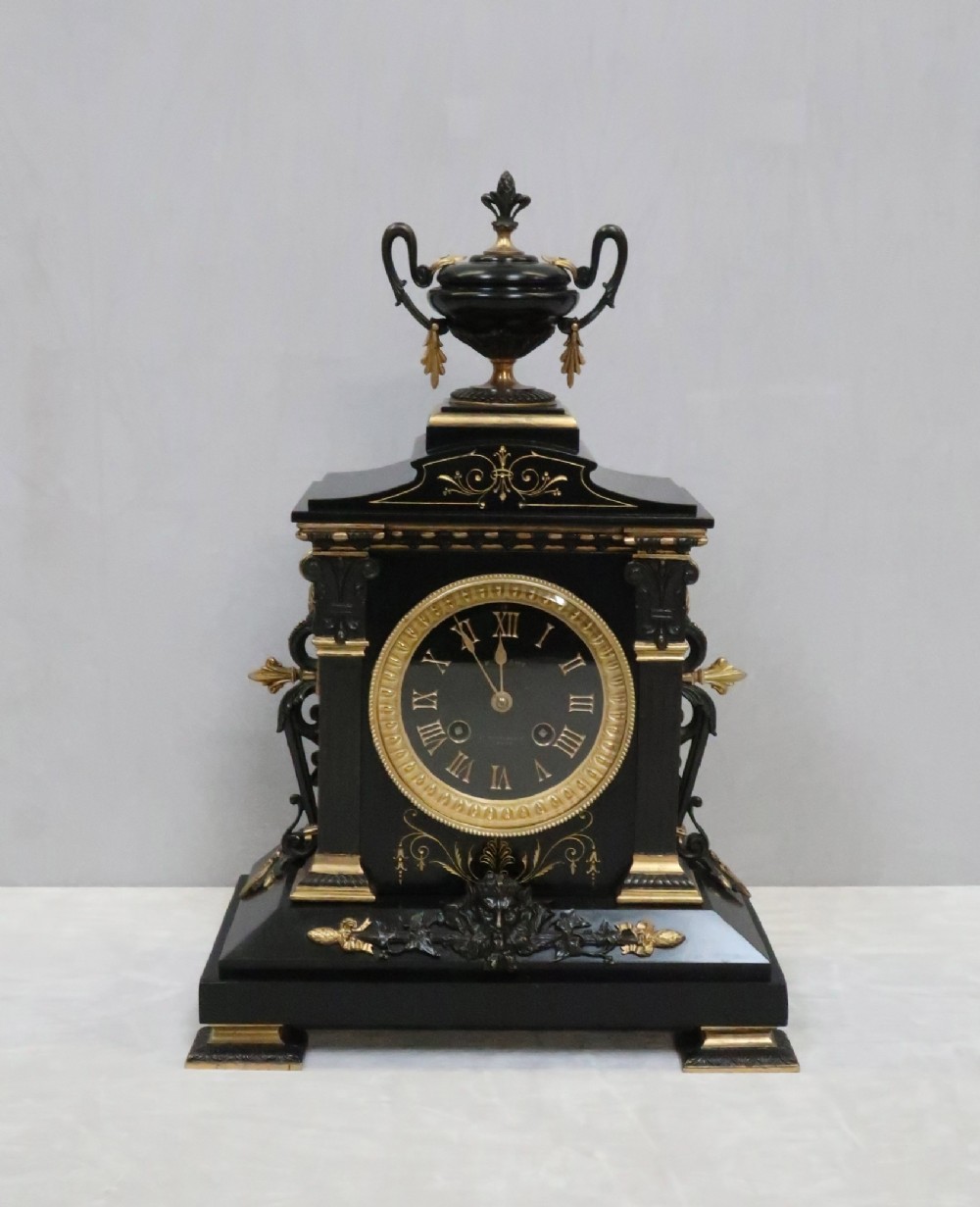 French Neoclassical Black Slate and Bronze Gilt Mantel Clock