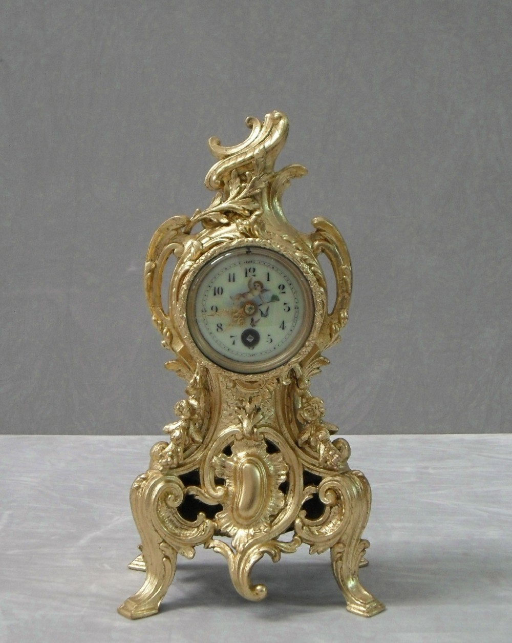 French Gilt Metal Rococo Style Mantel Clock