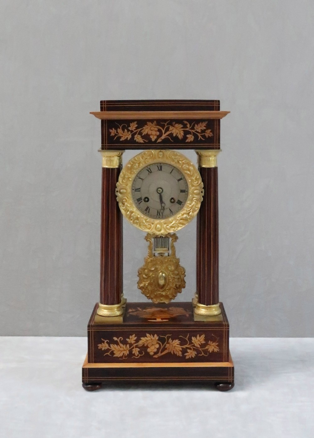 French Rosewood and Satinwood Portico Mantel Clock