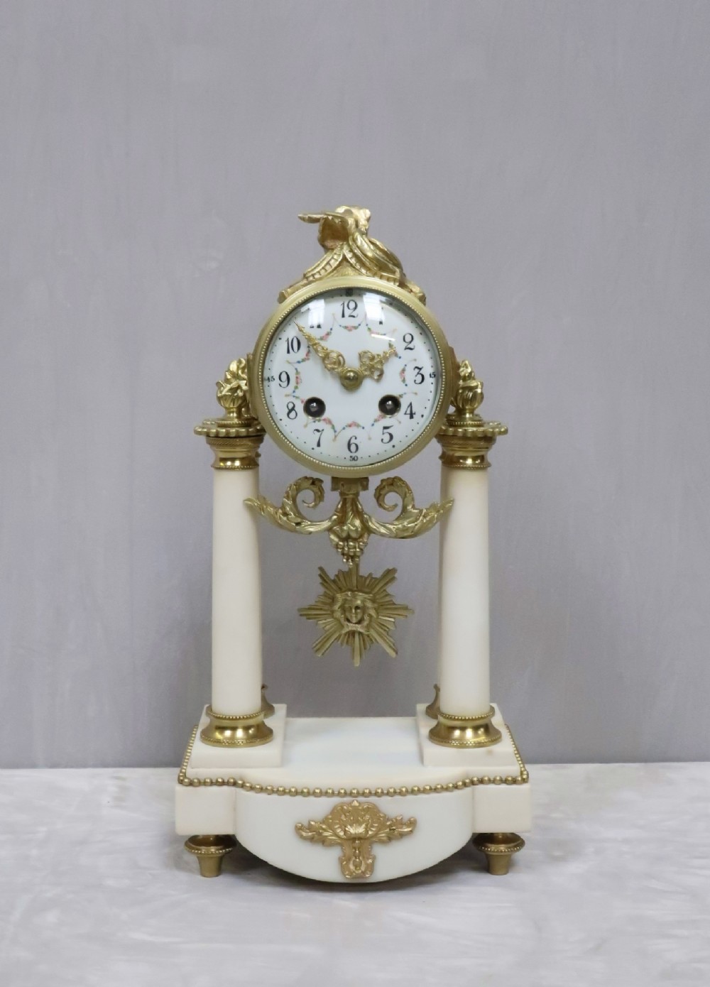 French Louis XVI Style White Marble Mantel Clock by Samuel Marti