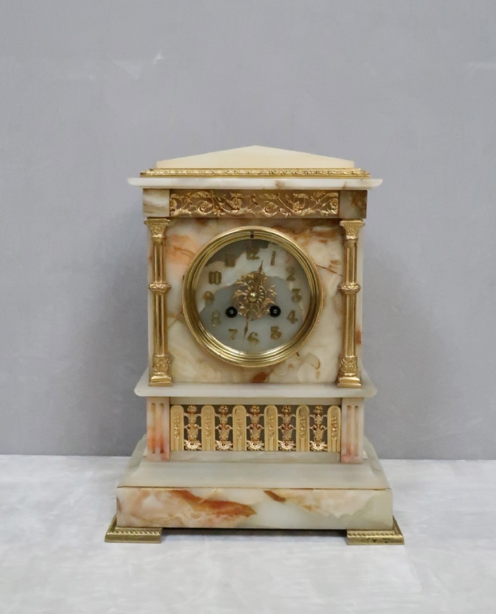 French Neoclassical Alabaster and Bronze Gilt Mantel Clock