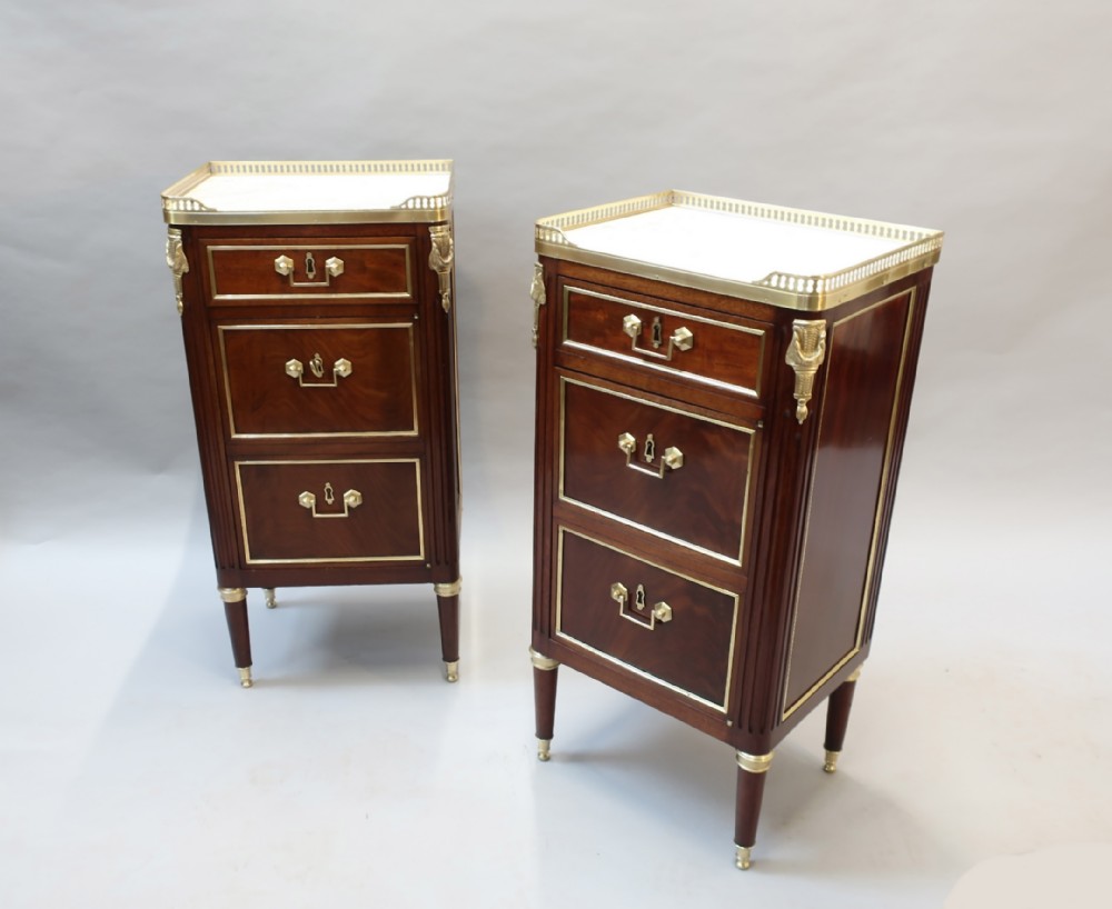 PAIR OF FRENCH MAHOGANY BEDSIDE CABINETS