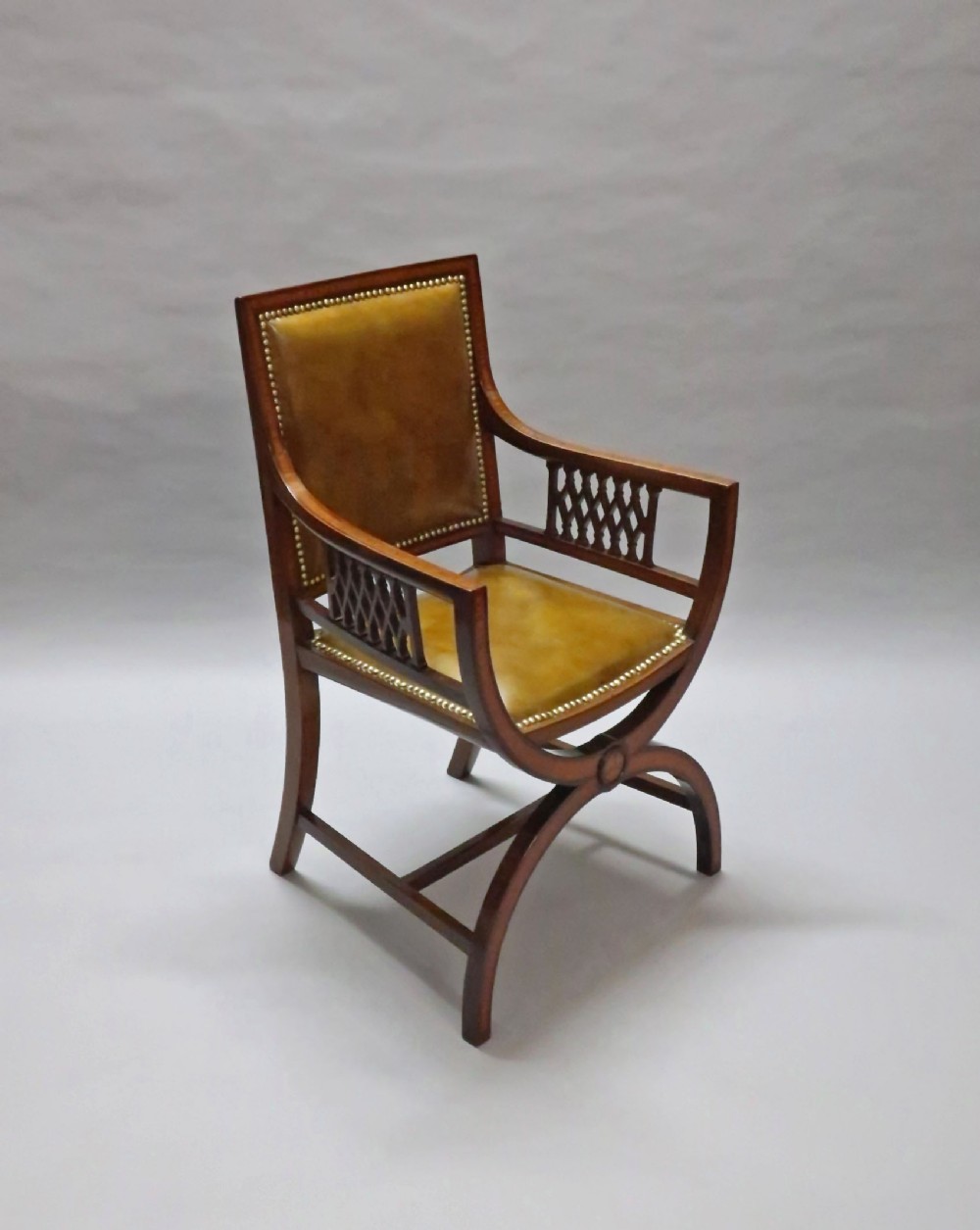 EDWARDIAN MAHOGANY AND LEATHER DESK CHAIR