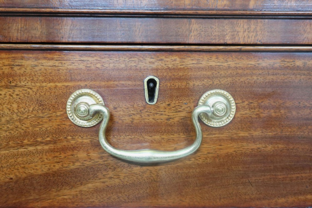 GEORGIAN FIGURED MAHOGANY CHEST OF DRAWERS View IV