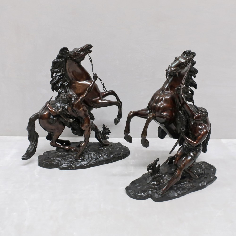 PAIR OF BRONZE MARLY HORSE SCULPTURES AFTER COUSTOU 
