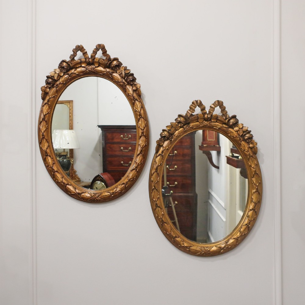 Pair of Italian Carved Wooden Gilt Wall Mirrors