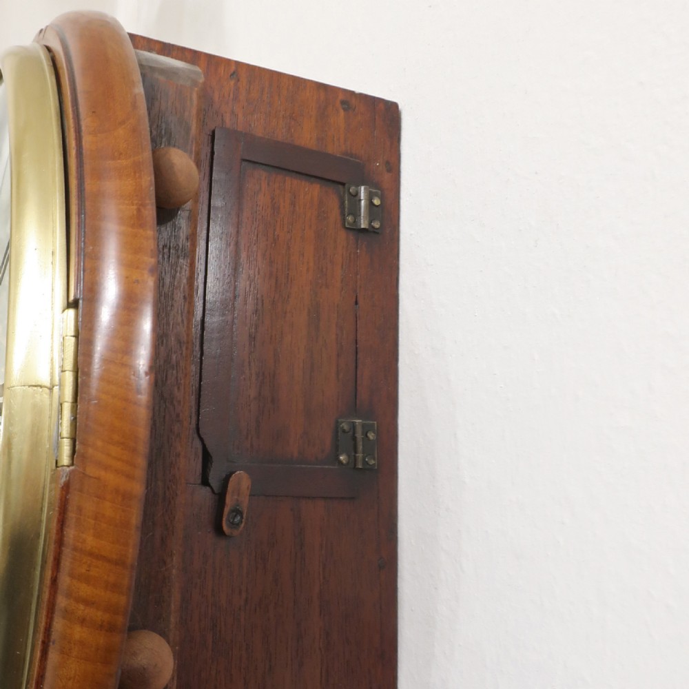 Victorian mahogany drop dial wall clock featuring brass inlay and a painted Roman numeral dial signed Joseph Mansfield Shaftesbury. View IX