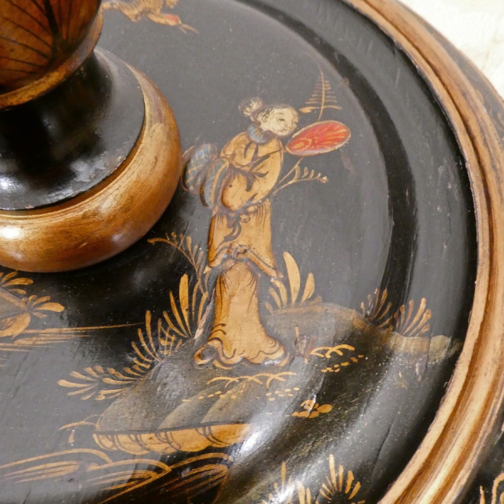 An Edwardian black lacquered standard lamp featuring hand-painted gold Chinoiserie motifs along a turned central shaft, resting on a moulded base with a fabric tassel shade. View III