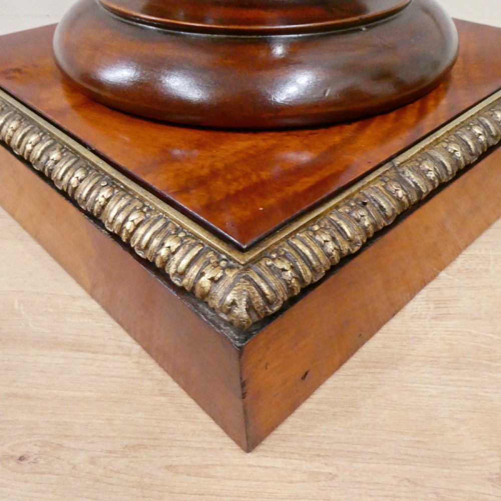 A pair of Victorian fluted satinwood column pedestals with square white marble tops and gilt mounts on plinth bases. View XI