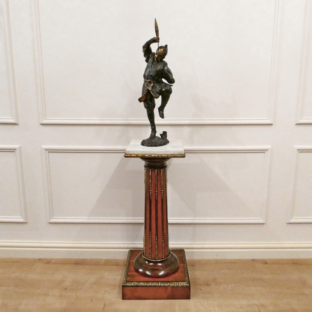 A pair of Victorian fluted satinwood column pedestals with square white marble tops and gilt mounts on plinth bases. View III