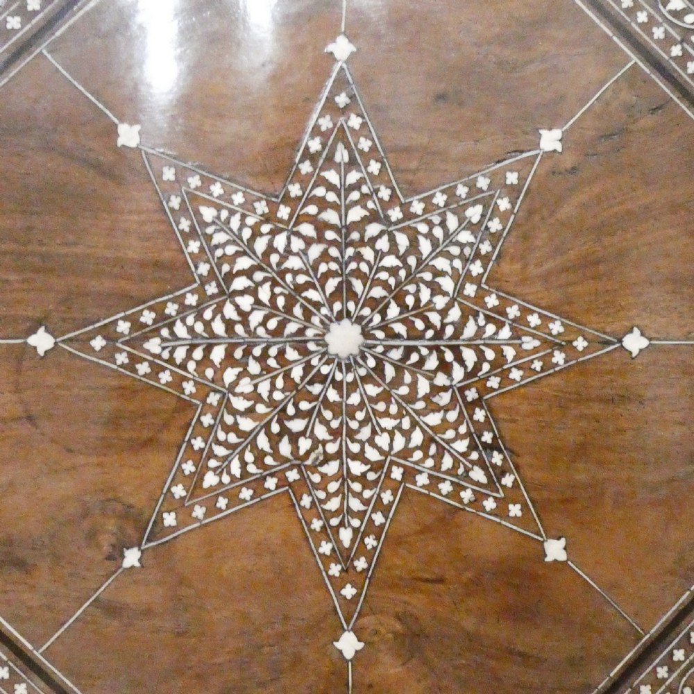 Late 19th-century octagonal wooden side table featuring intricate geometric bone inlay and an architectural arched base. View III