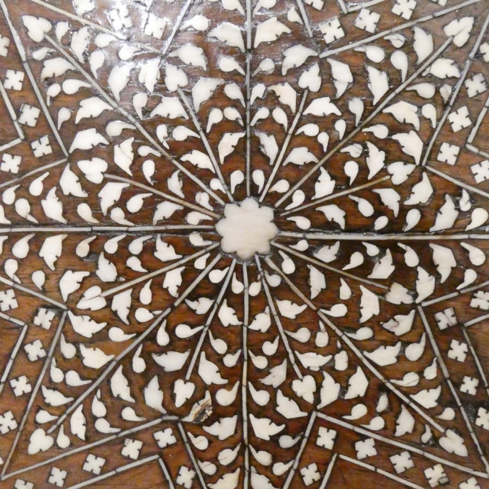 Late 19th-century octagonal wooden side table featuring intricate geometric bone inlay and an architectural arched base. View IV