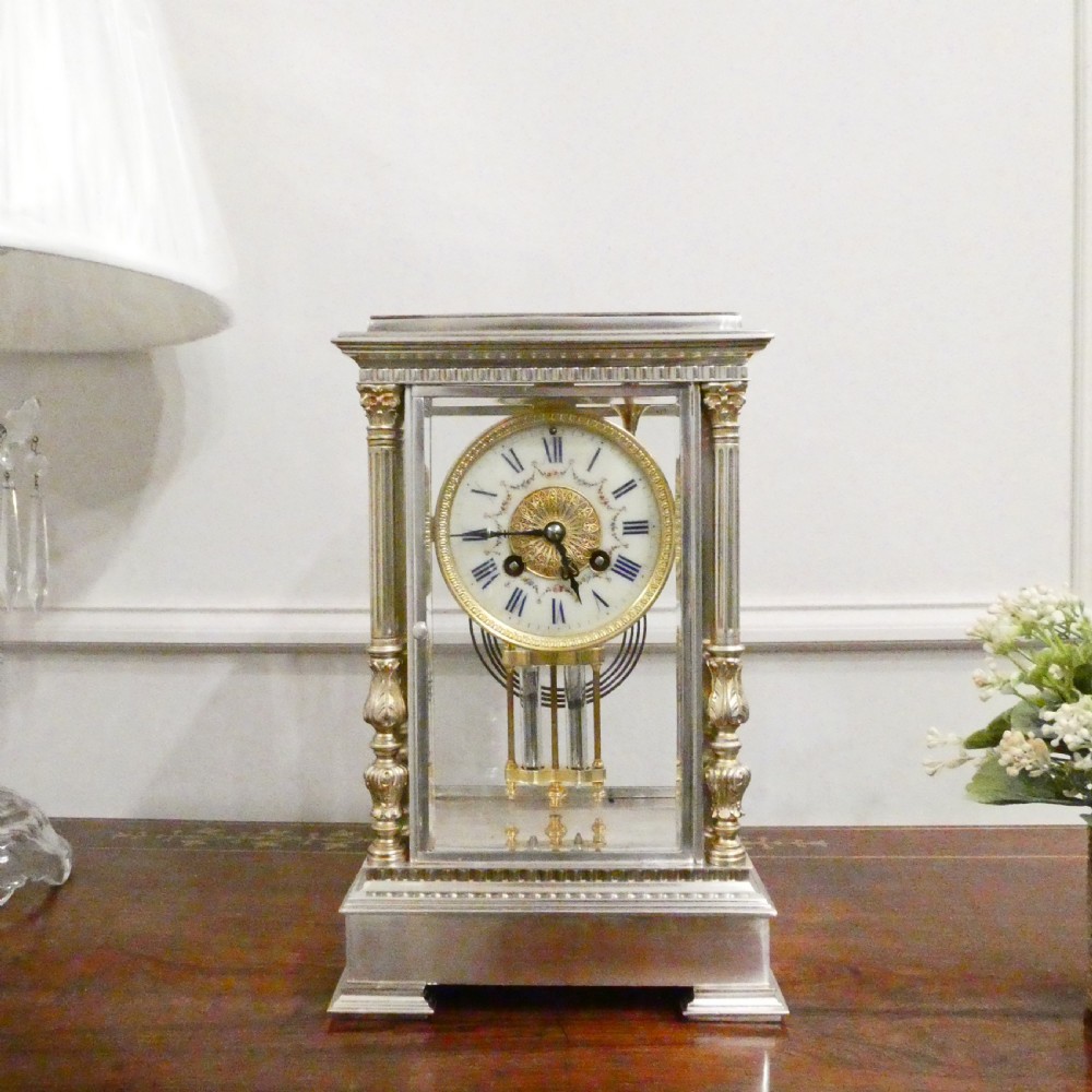 French Silver Four Glass Mantel Clock by Vincenti