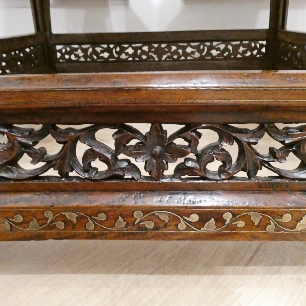 A late 19th-century square Anglo-Indian side table featuring brass inlay with a central star motif and pierced carved wood aprons. View XV