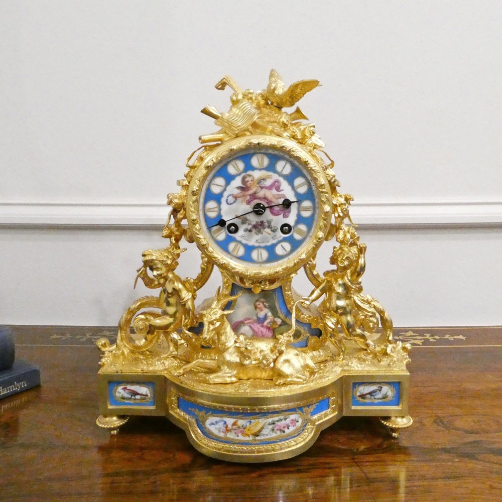 French Gilt Bronze & Porcelain Mantel Clock by Henry Marc
