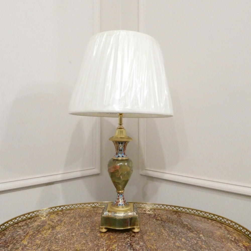 A pair of French table lamps featuring urn-shaped green onyx columns detailed with polychrome champleve enamelling and topped with pleated white shades. View XI