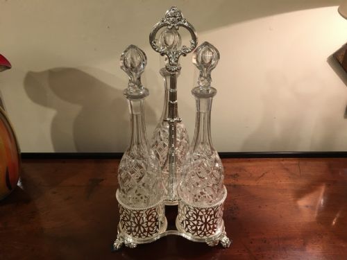 Elegant Three Bottle Wine Decanter Tantalus with Matching Decanters 19th Century