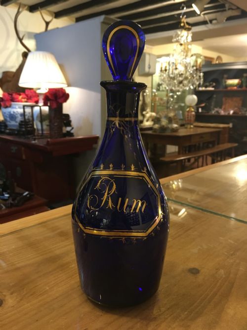 A Geo III Bristol Blue Clubshape Gilding Rum Decanter C1800