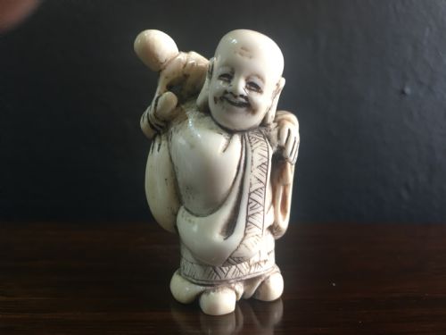 signed meiji period ivory netsuke of motei with sack double gourd on back late c19th - CATEGORY: ANTIQUE MISCELLANEOUS - DATED 19TH CENTURY