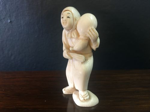 meiji period ivory netsuke of man with happyangry faces c19th - CATEGORY: ANTIQUE MISCELLANEOUS - DATED 19TH CENTURY