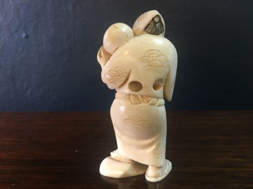 MEIJI PERIOD IVORY NETSUKE OF MAN WITH HAPPYANGRY FACES C19TH - ADDITIONAL PHOTO 2