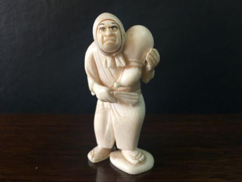 MEIJI PERIOD IVORY NETSUKE OF MAN WITH HAPPYANGRY FACES C19TH - ADDITIONAL PHOTO 4