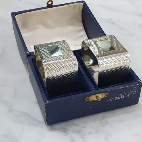 GEO VI PAIR STERLING SILVER BOXED NAPKIN RINGS ENGINE TURNED DESIGN WITH BLANK CARTOUCHE FOR ENGRAVING - ADDITIONAL PHOTO 1