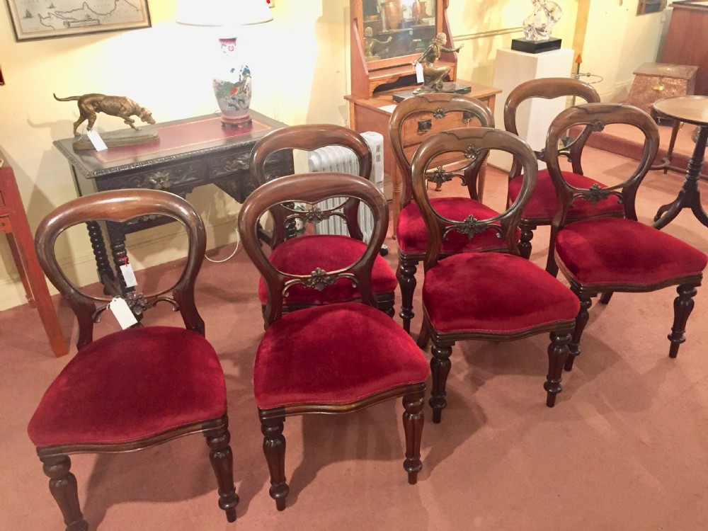 Set of 7 Victorian Walnut Balloon Back Chairs c.1880