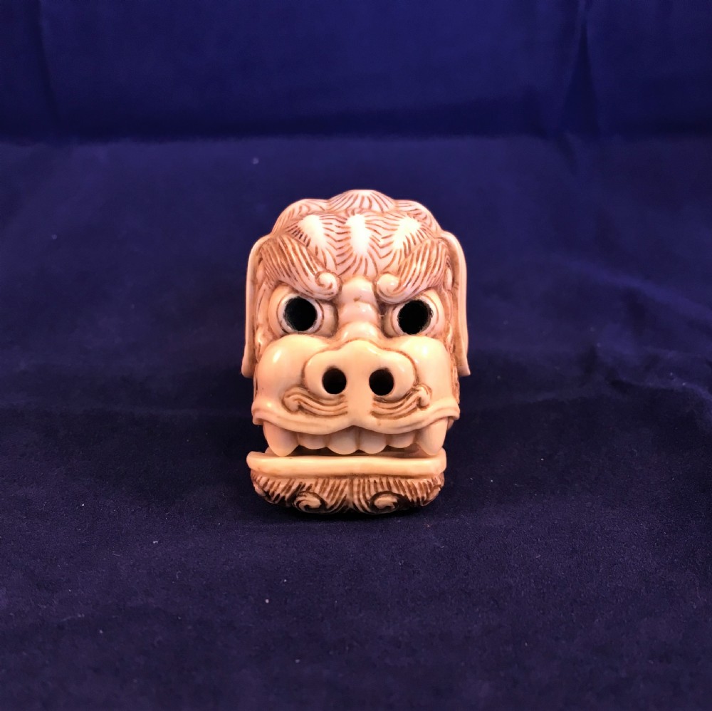 Meiji Period (1868-1912) Ivory Netsuke of a Shishi Head (with moveable jaw) SIGNED