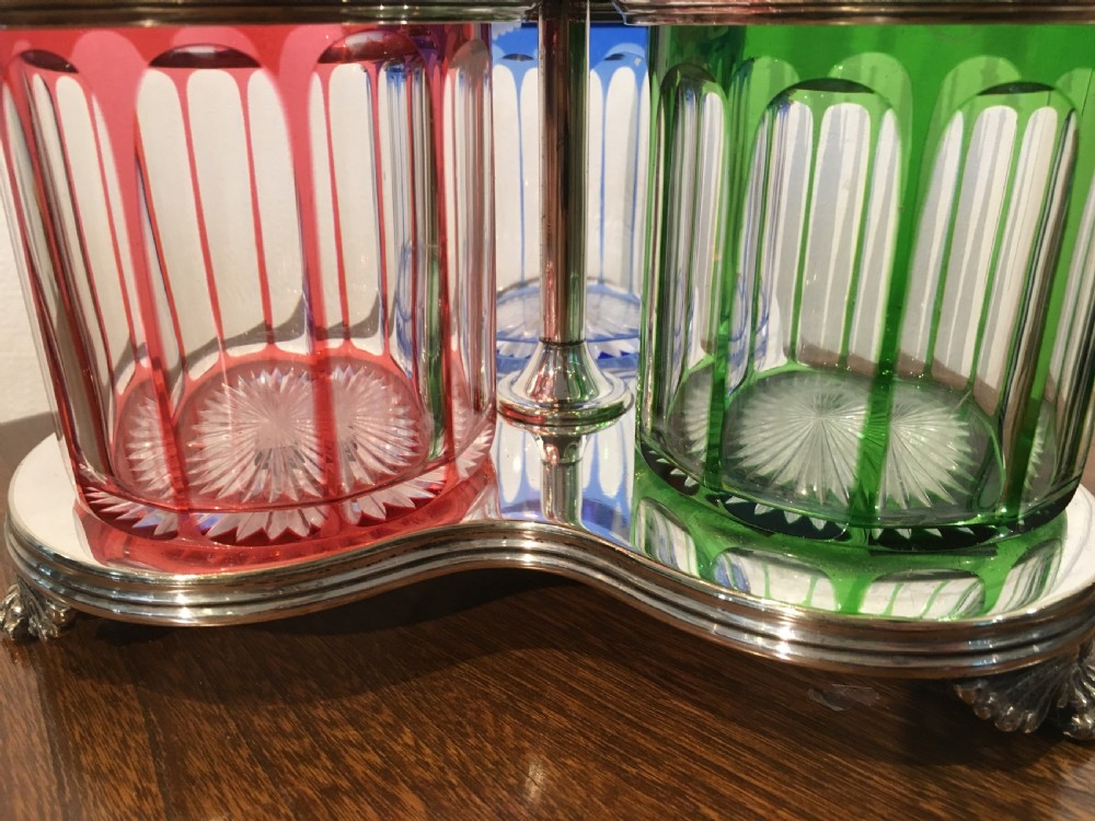 Three Coloured Tall Cut Vine & Grape Engraved Decanters in a Handled Stand c1840 View IV