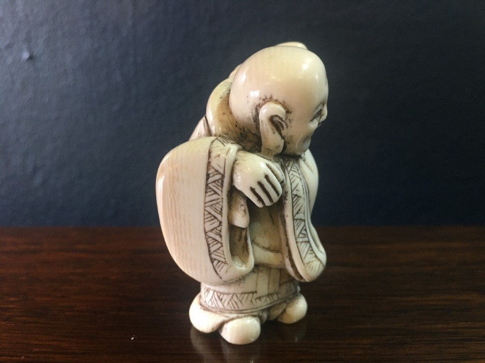 Signed Meiji Period Ivory Netsuke of Motei with Sack & Double Gourd on Back Late C19th View V