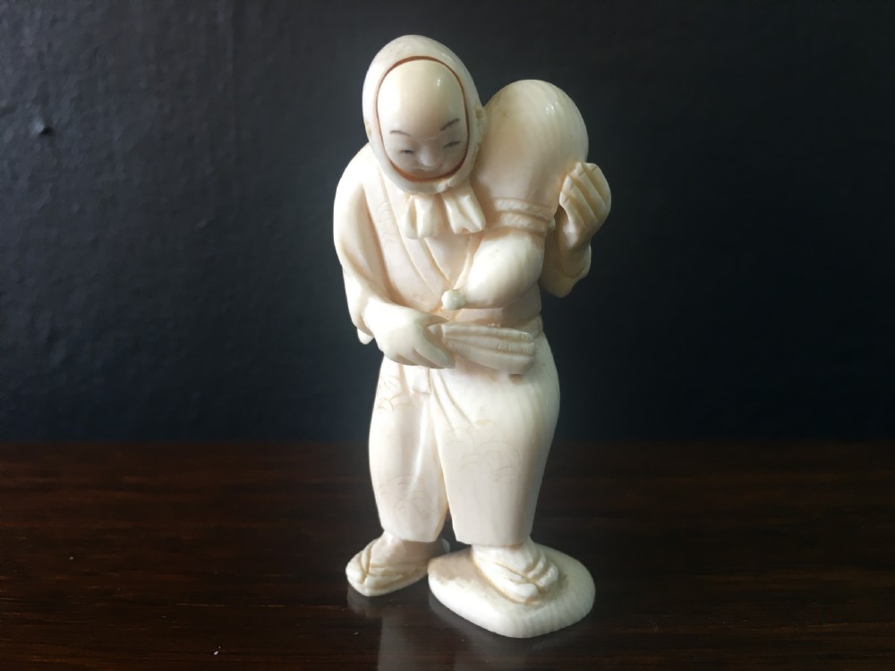 Meiji Period Ivory Netsuke of Man with Happy/Angry Faces C19th View II