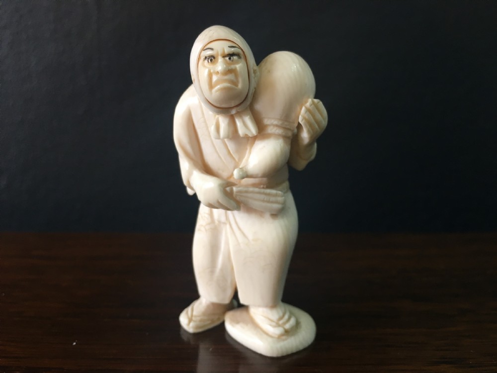 Meiji Period Ivory Netsuke of Man with Happy/Angry Faces C19th View V