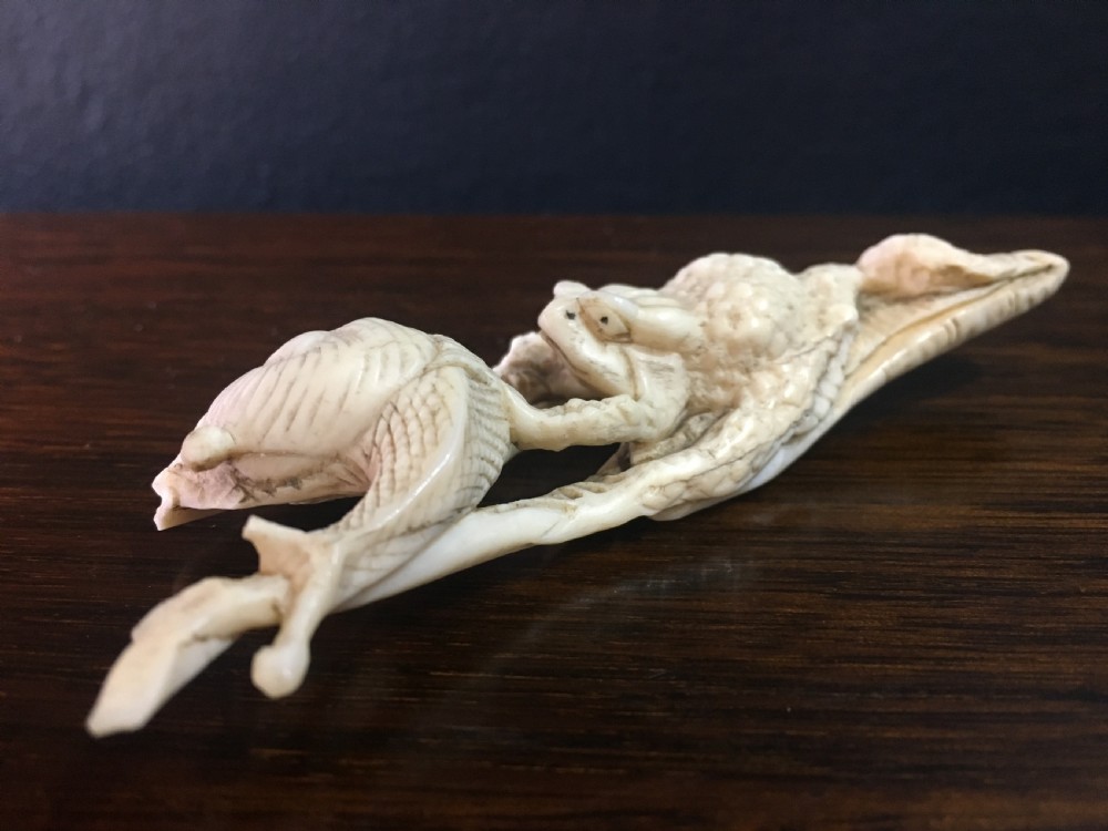 Meiji Period Ivory Netsuke of Toad Pushing a Snail on Lotus Leaf C19th