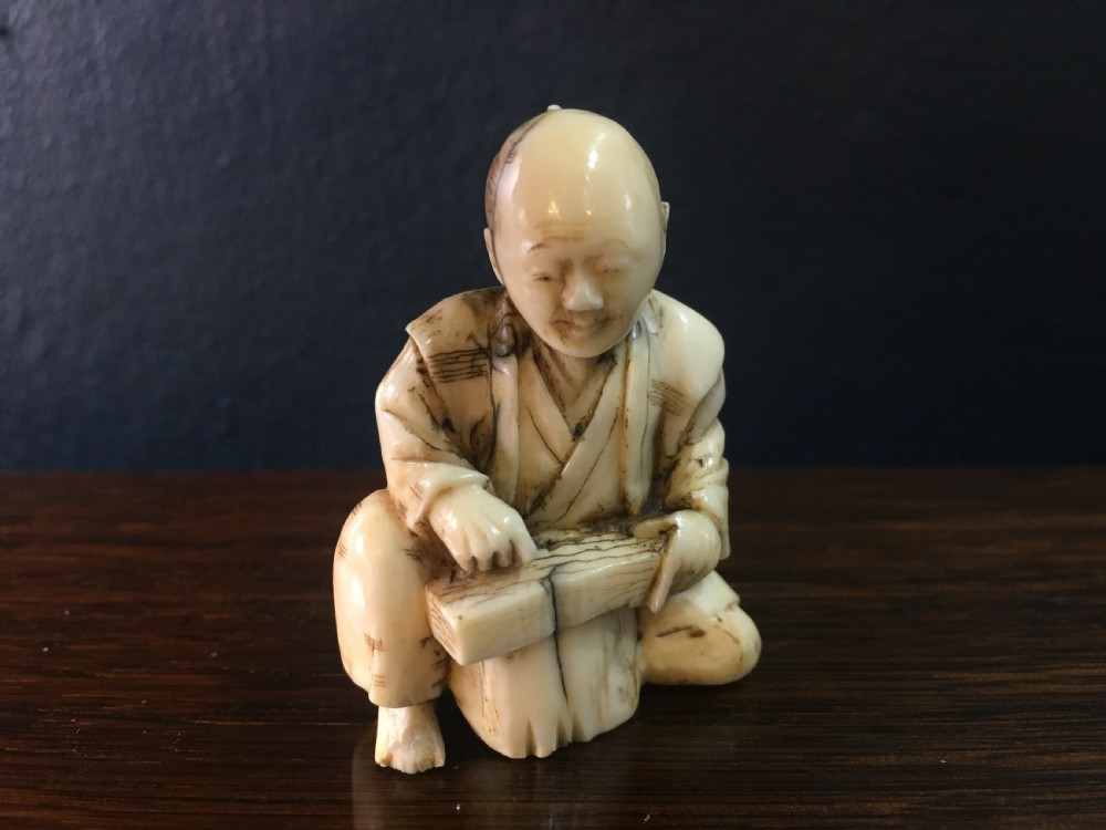 Meiji Period Ivory Okimono Man with Tree Stump C19th