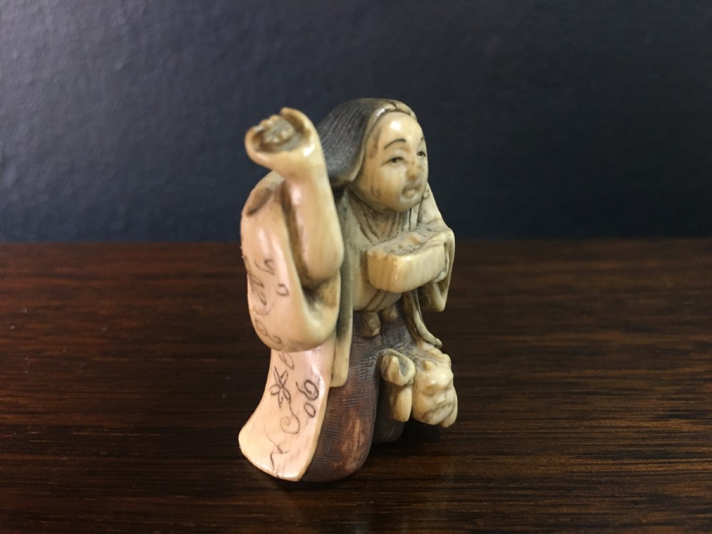 Signed Meiji Period Ivory Netsuke of Deity & Ononi C19th View III