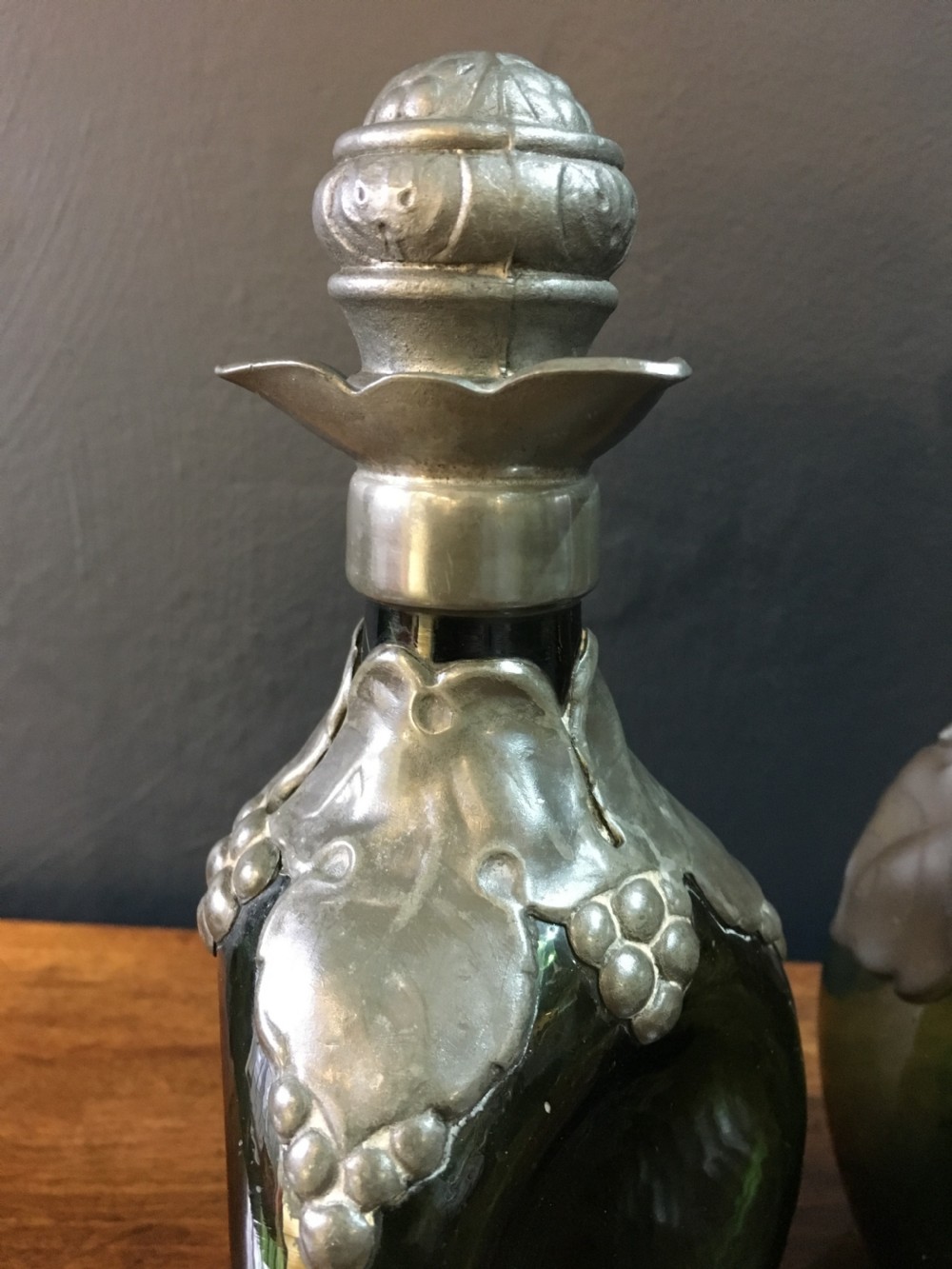 Two Art Nouveau Glass Bottles with Pewter Overlay Decoration & Stoppers C19th View III